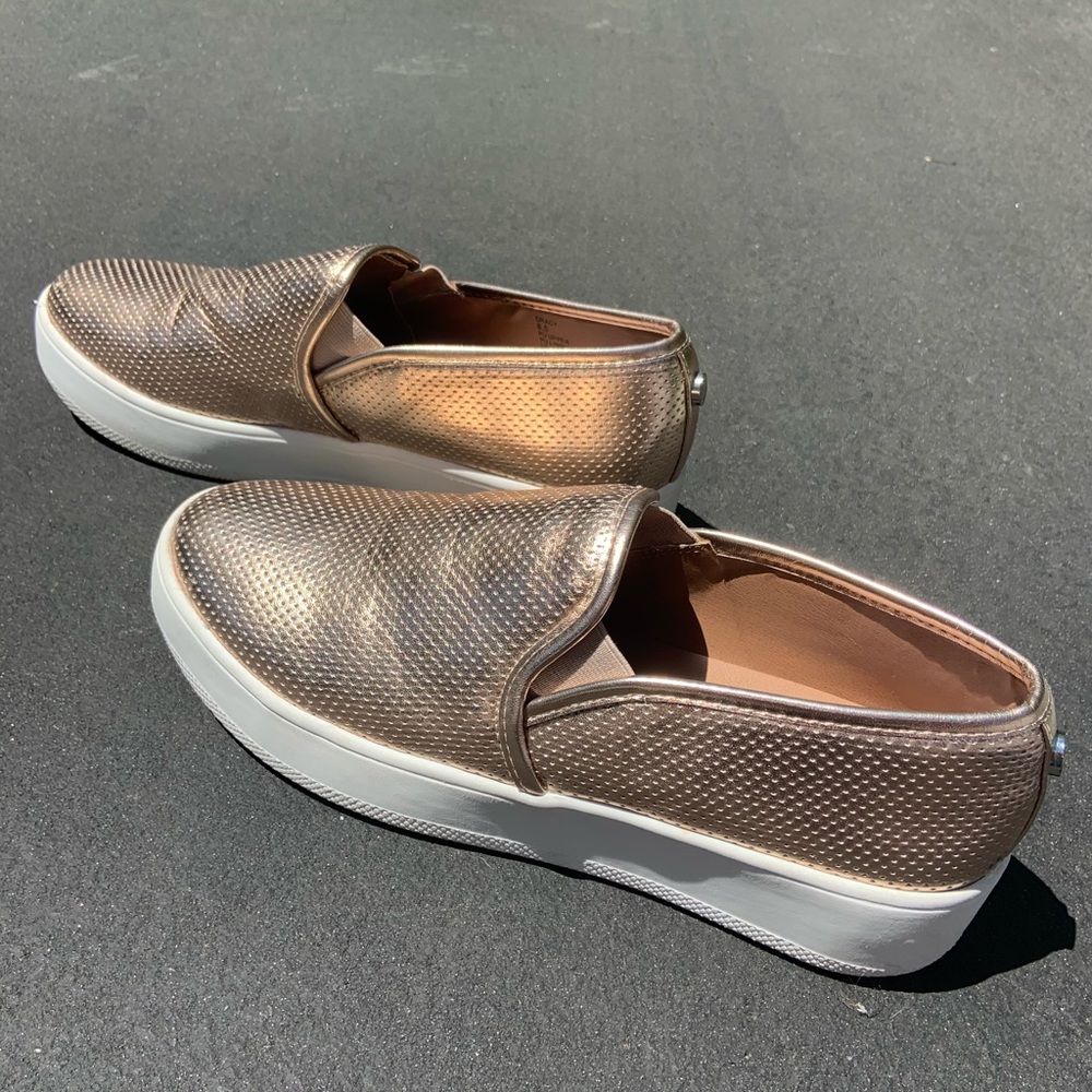 Gold Steve Madden slip-ons